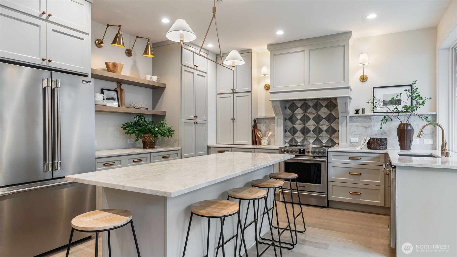 Stainless appliances including the fridge.