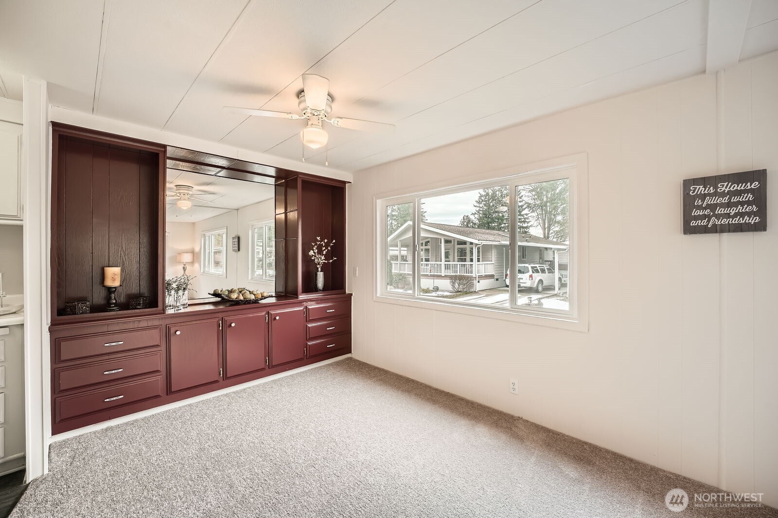 Splendid solid wood built-in cabinets are useful for displays and entertaining