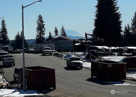 Yes, you can look down the street from the comfort of your media room & see Mount Rainier!