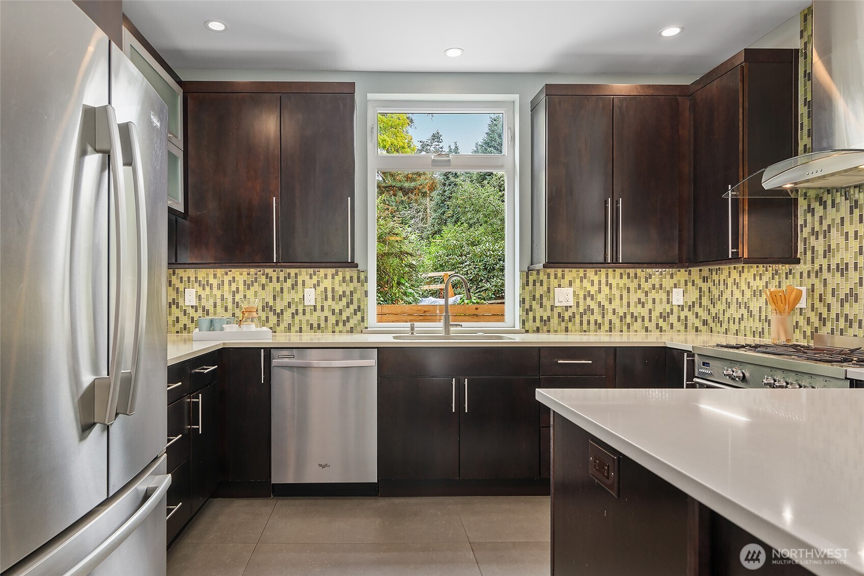 Custom cabinets with soft close and slab quartz countertop