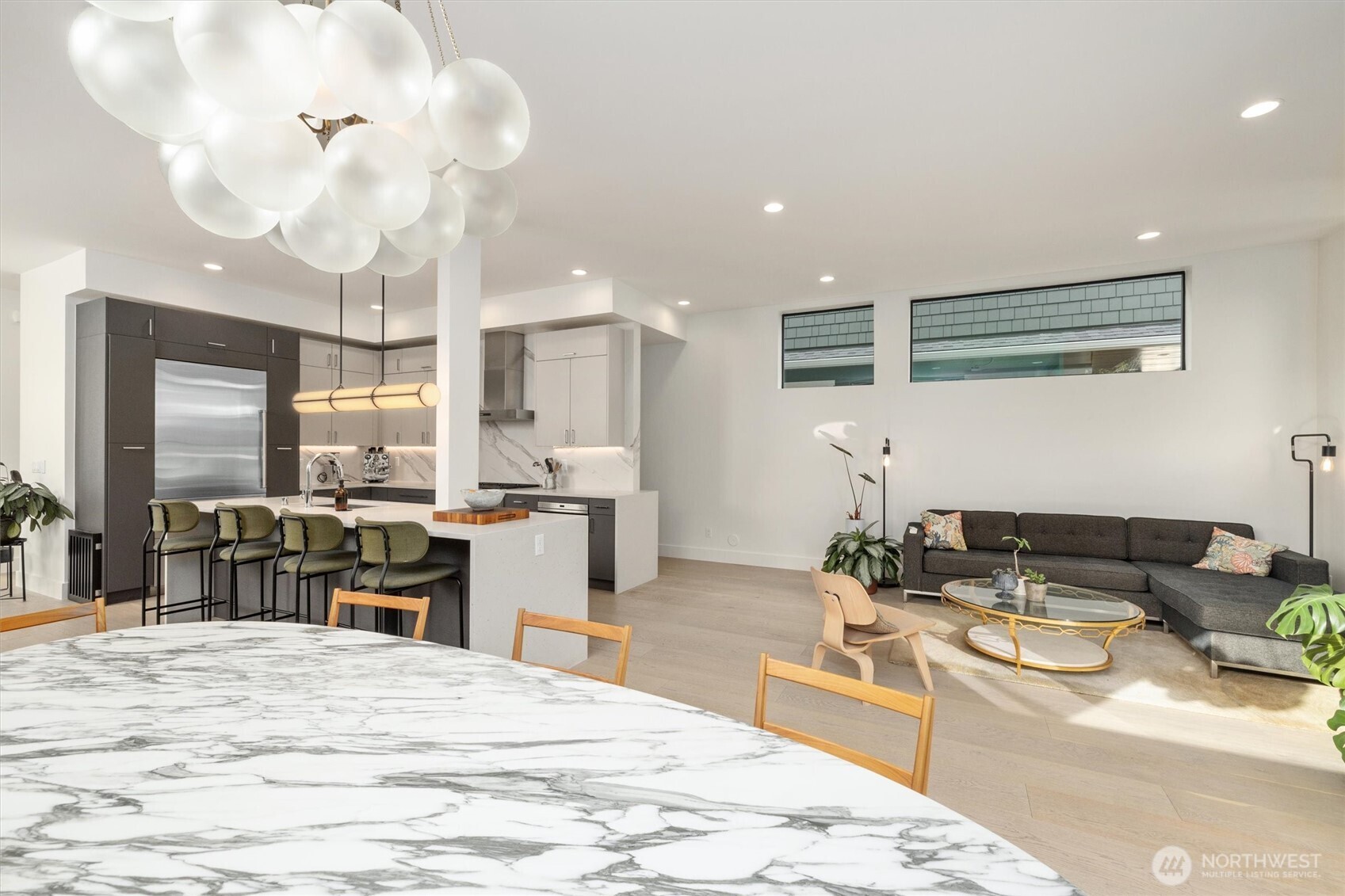 Kitchen and dining flow to 2nd living room. Truly the heart of the home.