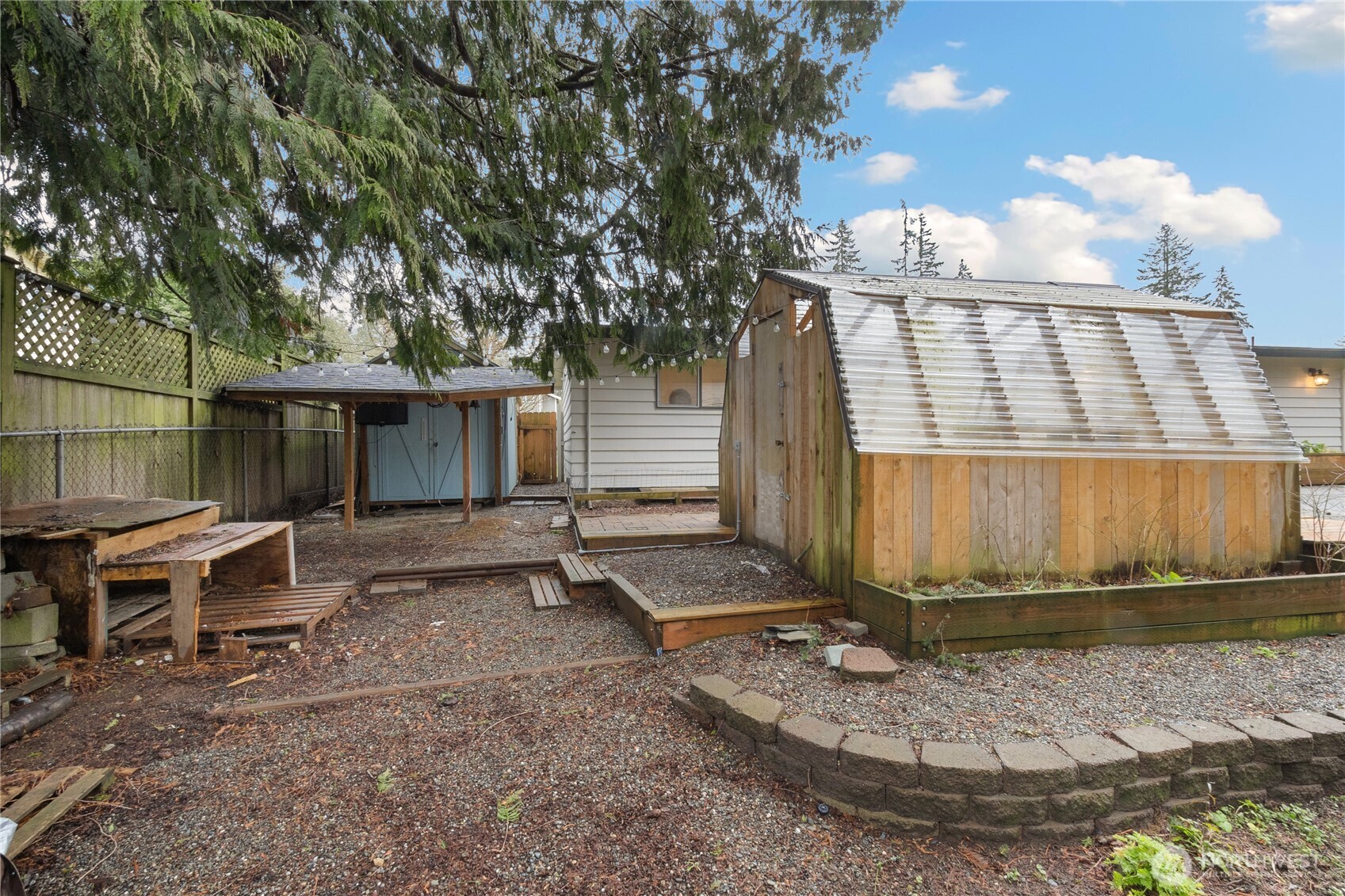 Greenhouse and outbuilding