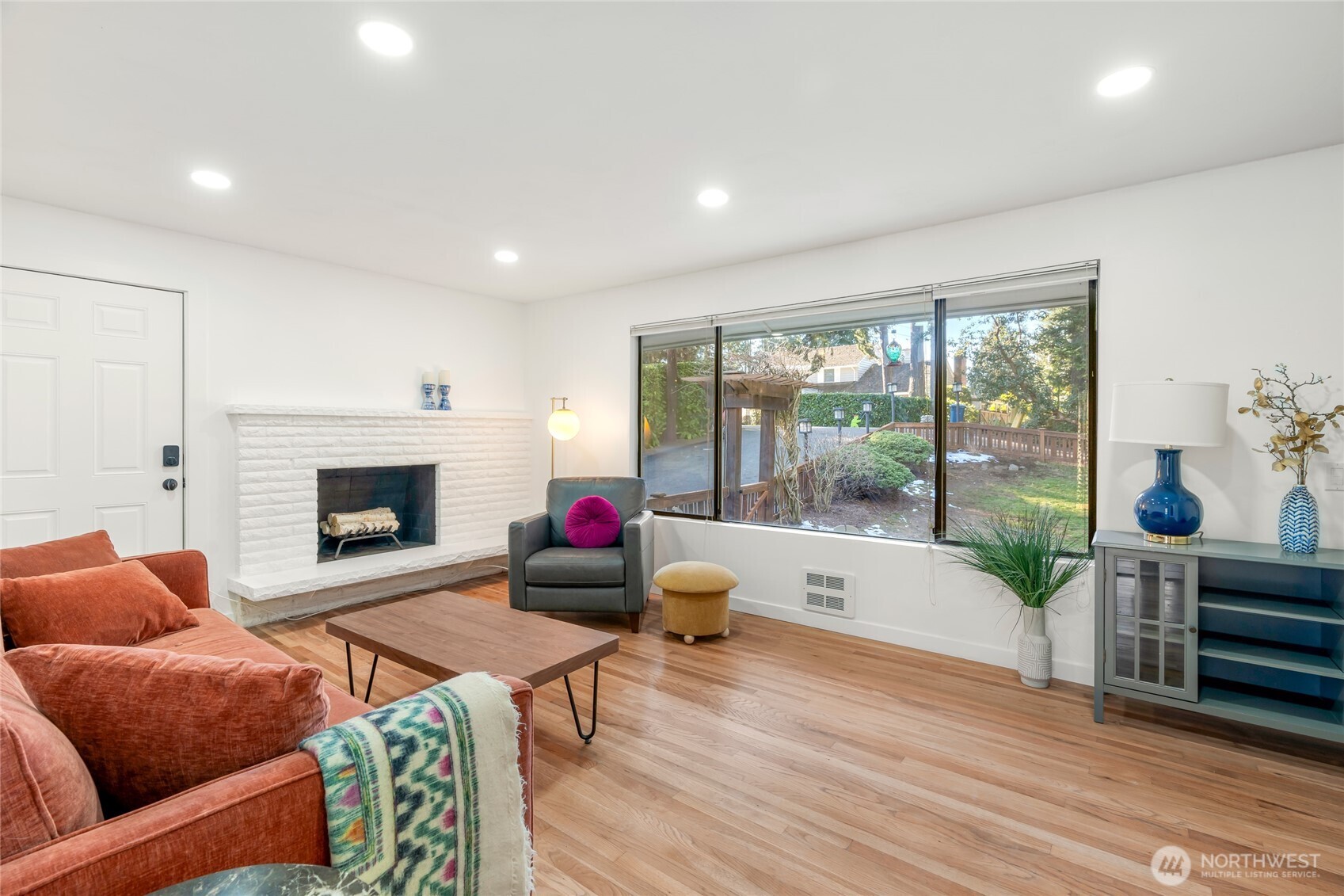 Original wood-burning fireplace and hardwoods. Fresh paint throughout.