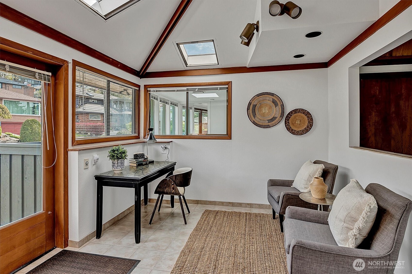 Sitting room also has its own entry and space for a desk for the occasional work from home days.