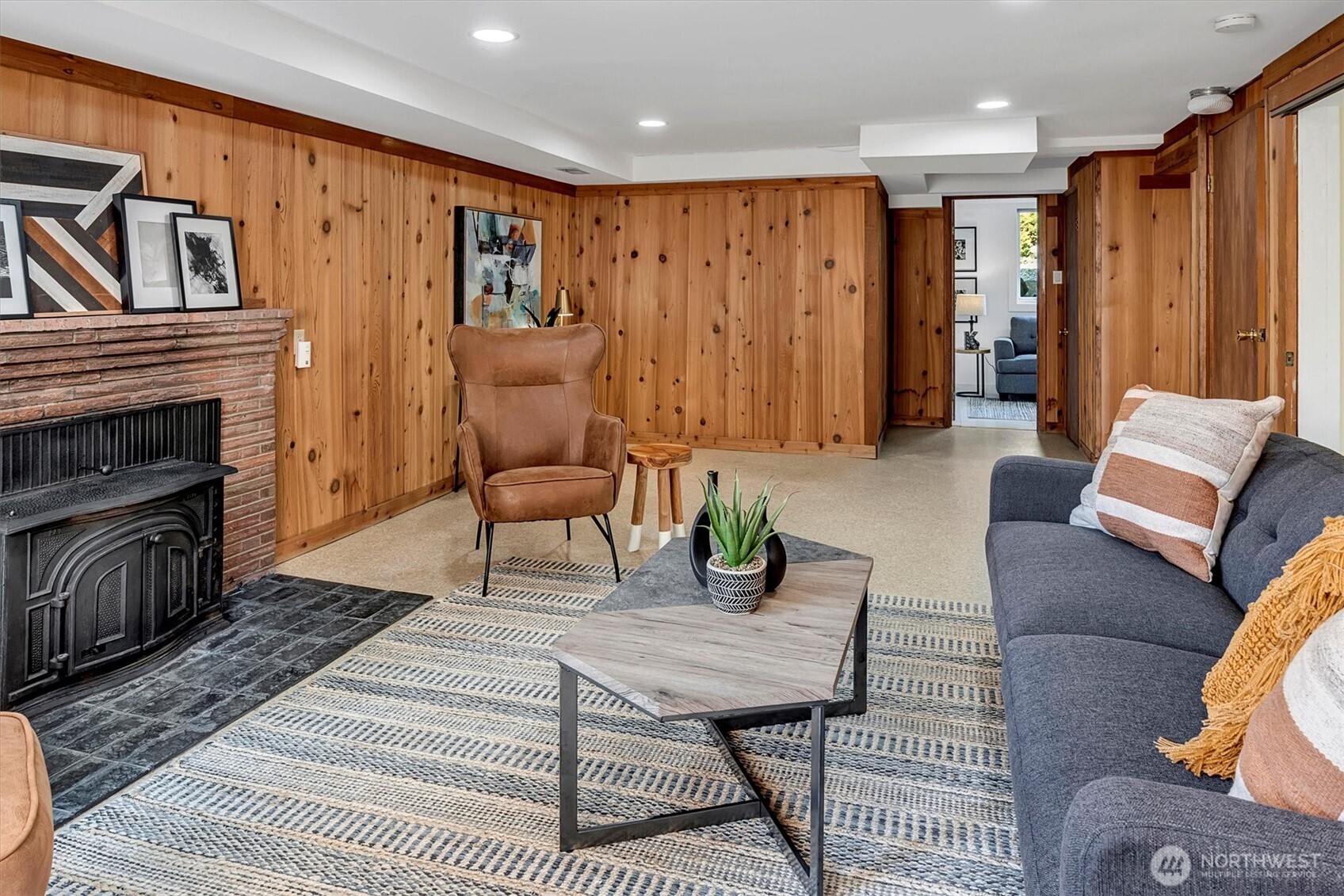 Entry is on the right wall from above and the doorway leads to another bedroom.