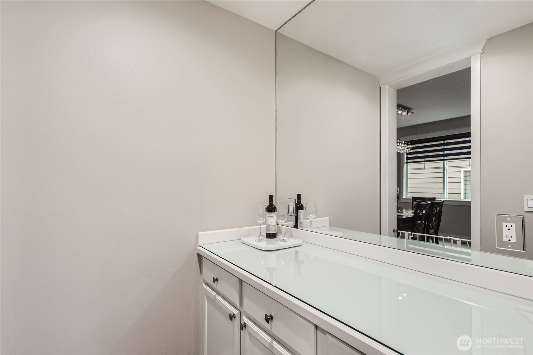 A butler's pantry off the kitchen and open to the dining area adds convenience when entertaining.