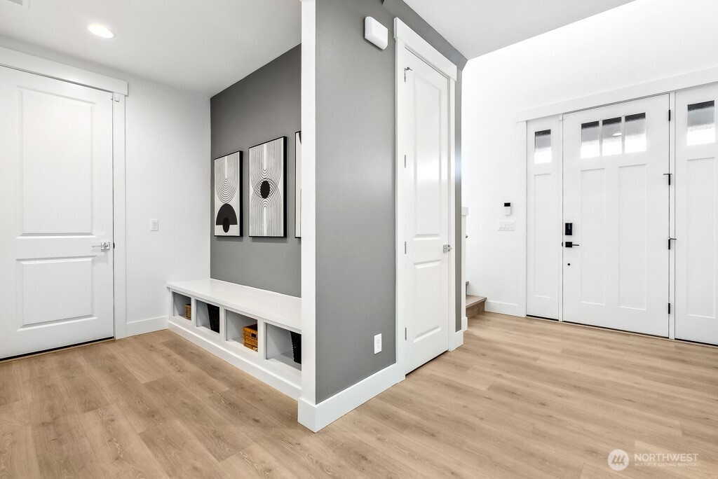 Convenient "mud room" off of garage, and spacious entry from the front door.