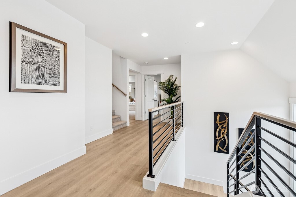 Light-filled and open second floor landing.