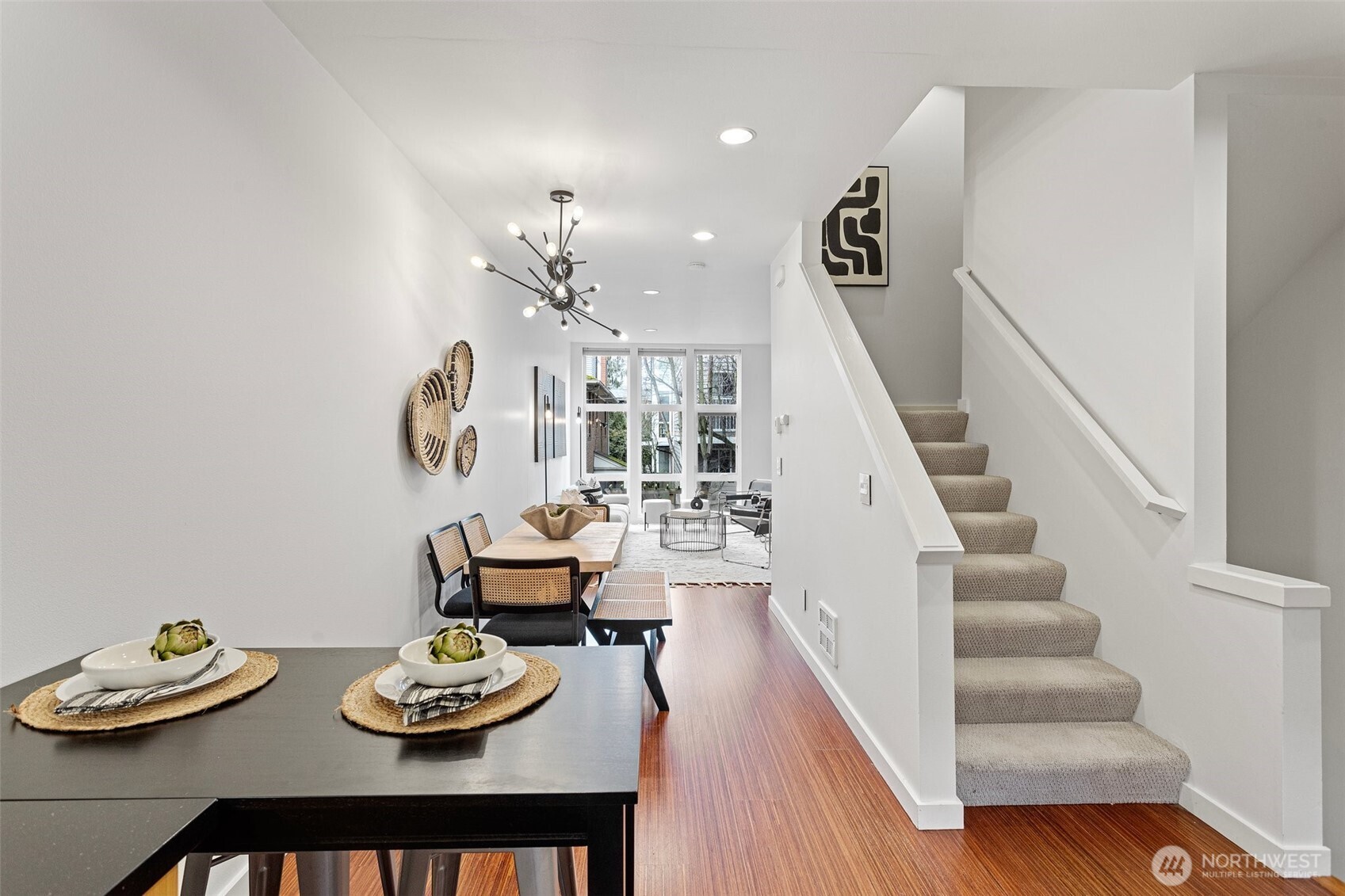 Kitchen has space for a coffee table or breakfast nook.