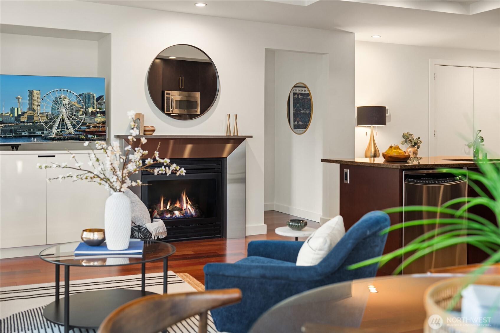 A gas fireplace adds to the warmth of the forced air heating and cooling.