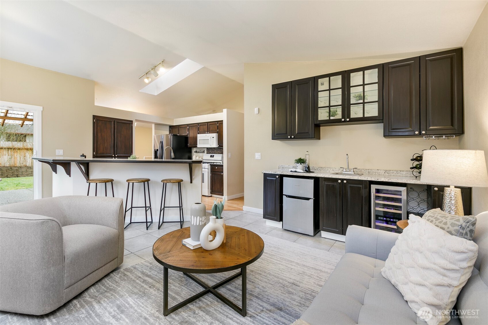 Family room w/ wet bar & wine fridge