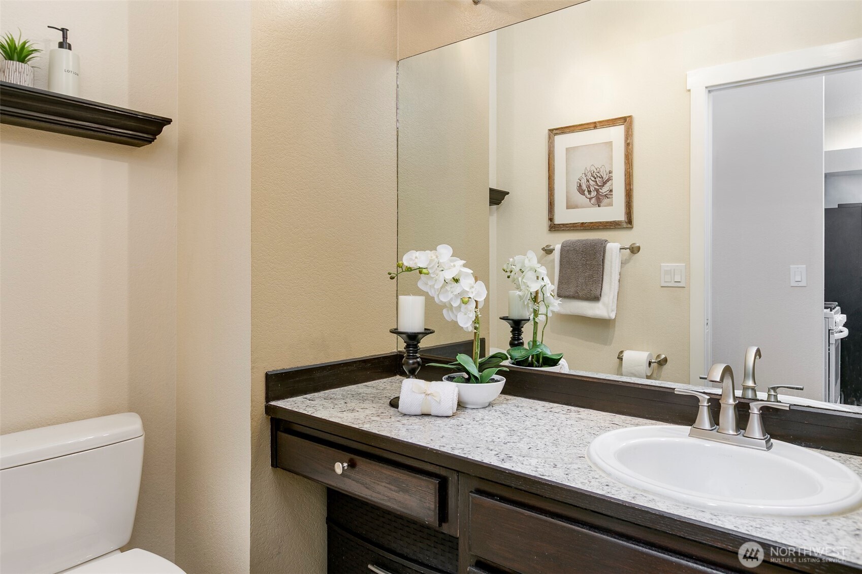 Powder room off kitchen & family room area