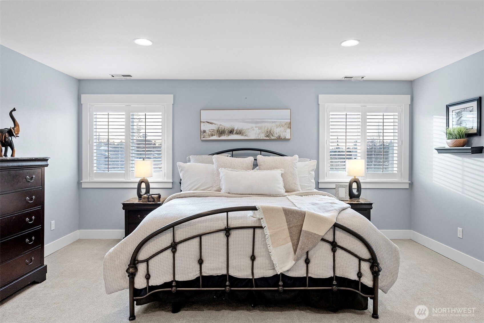 Primary Bedroom with TONS of room and natural light.