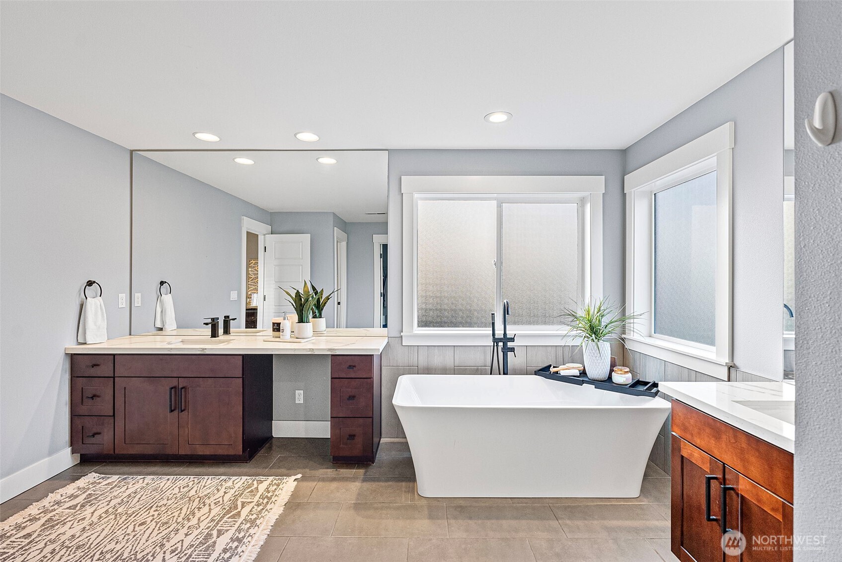 Expansive spa-like primary bathroom.