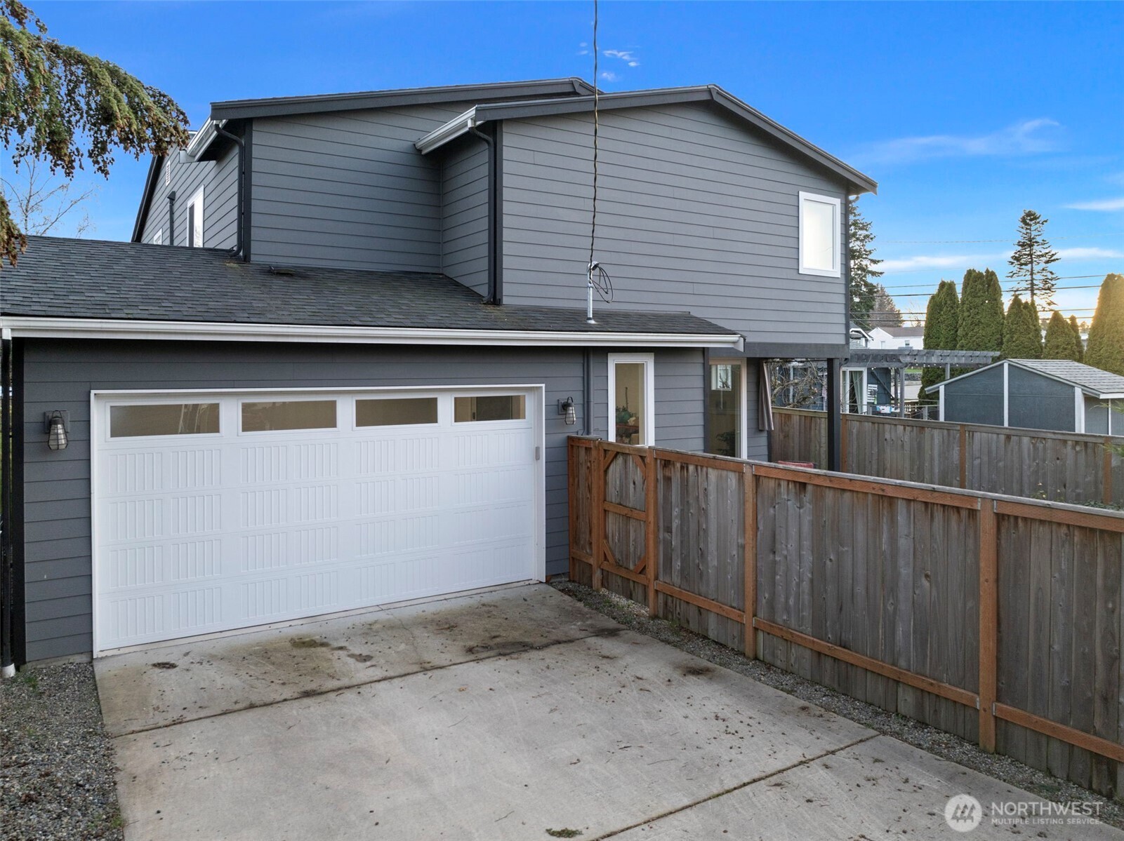 The garage & driveway are located off the alley.