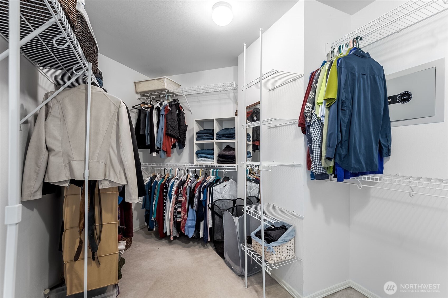 Walk-in closet with wall safe