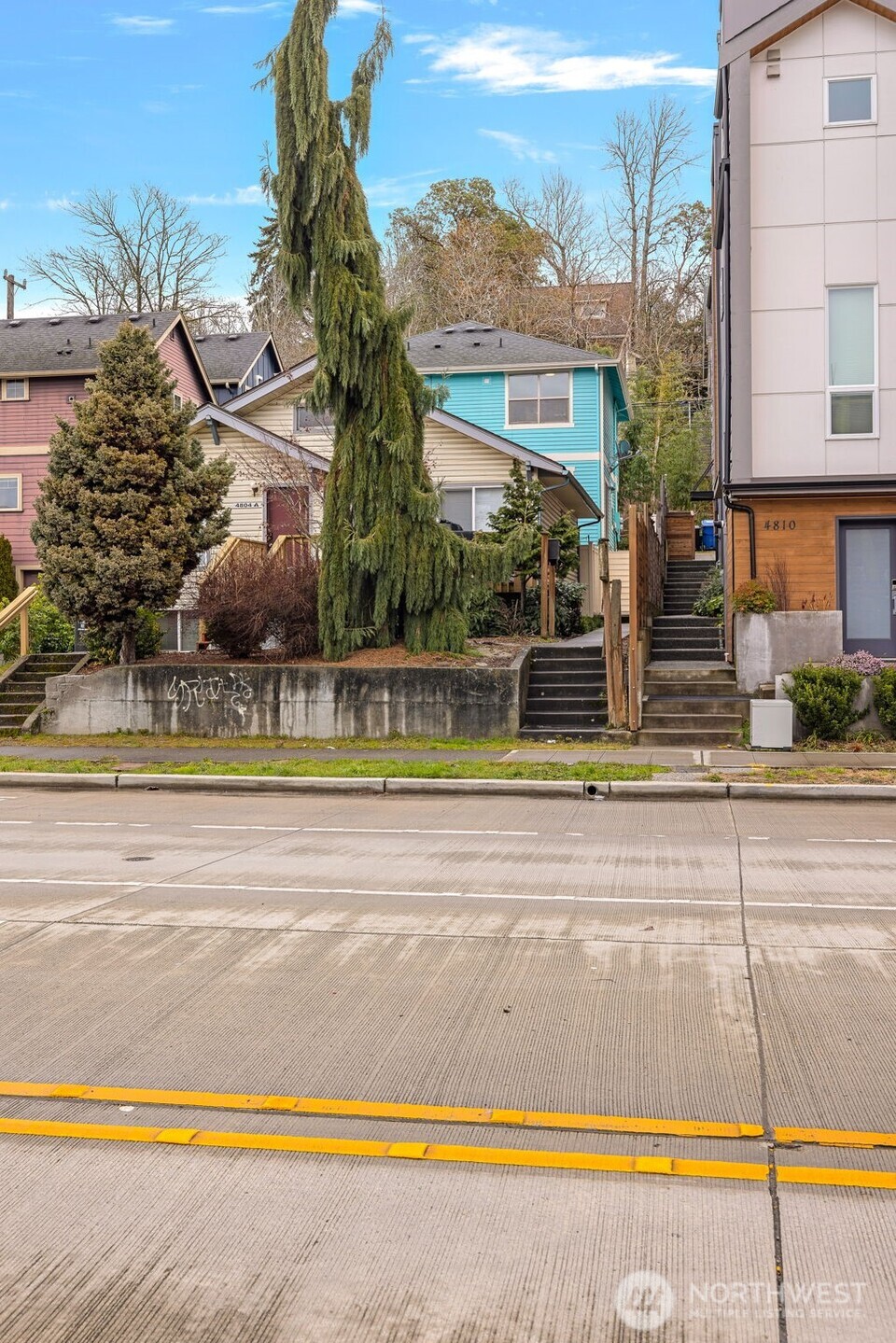 Street veiw.  Town house is in the back of the house.