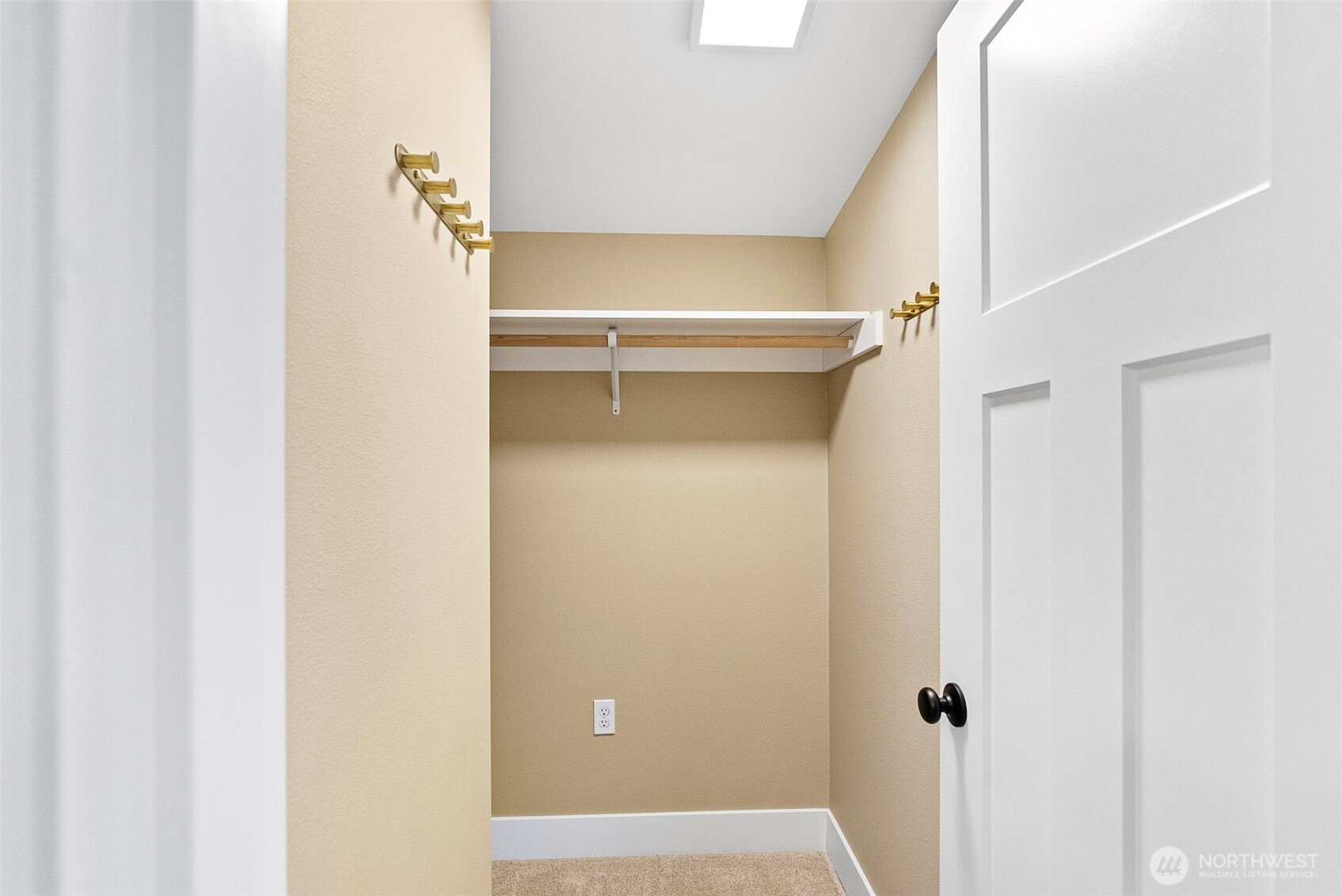 Generously sized walk-in closet off the primary bedroom.