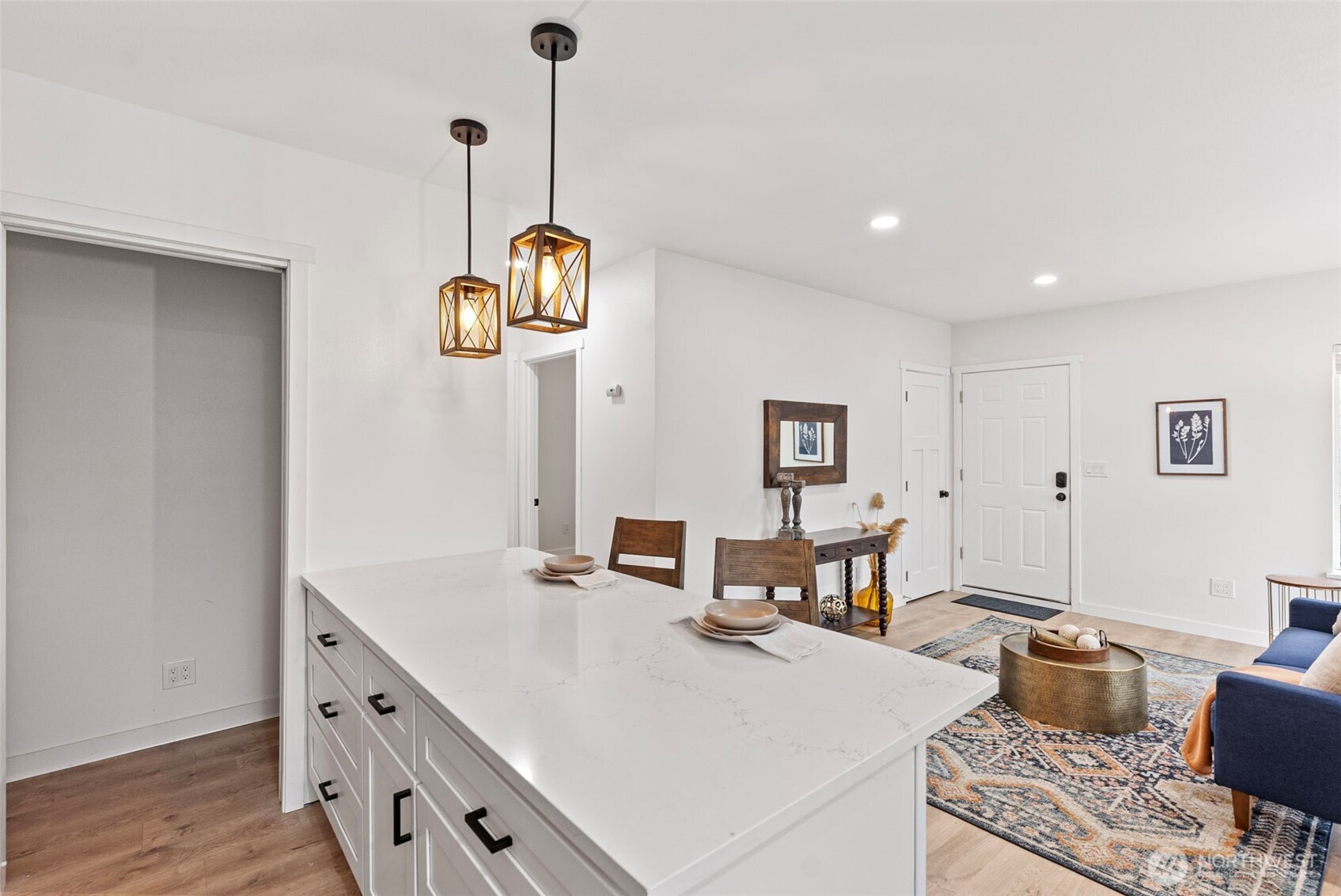 The tankless water heater is in the pantry closet to the left - along with TONS of open shelving for pantry storage.