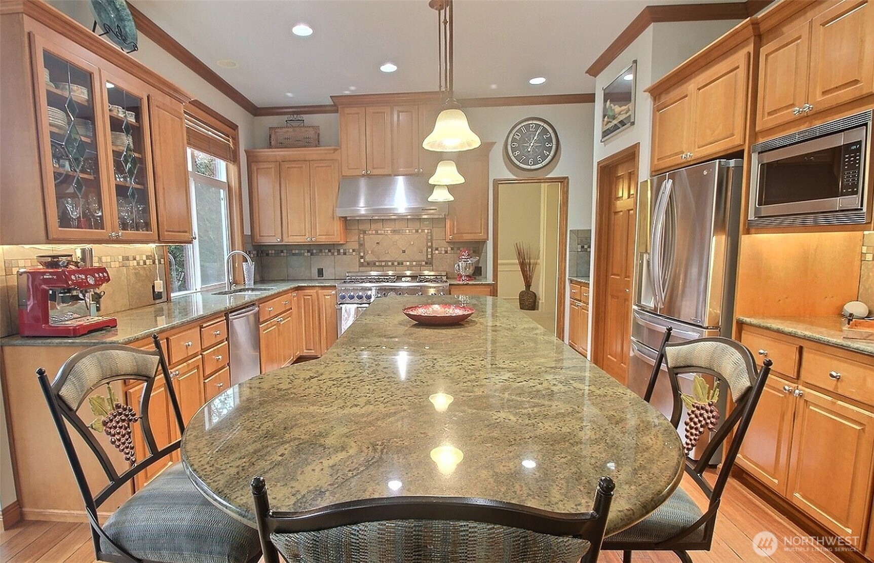 All part of the Great room includes the Kitchen, tall 3-sided windows for the breakfast nook, and a huge Family room (not shown in this image).