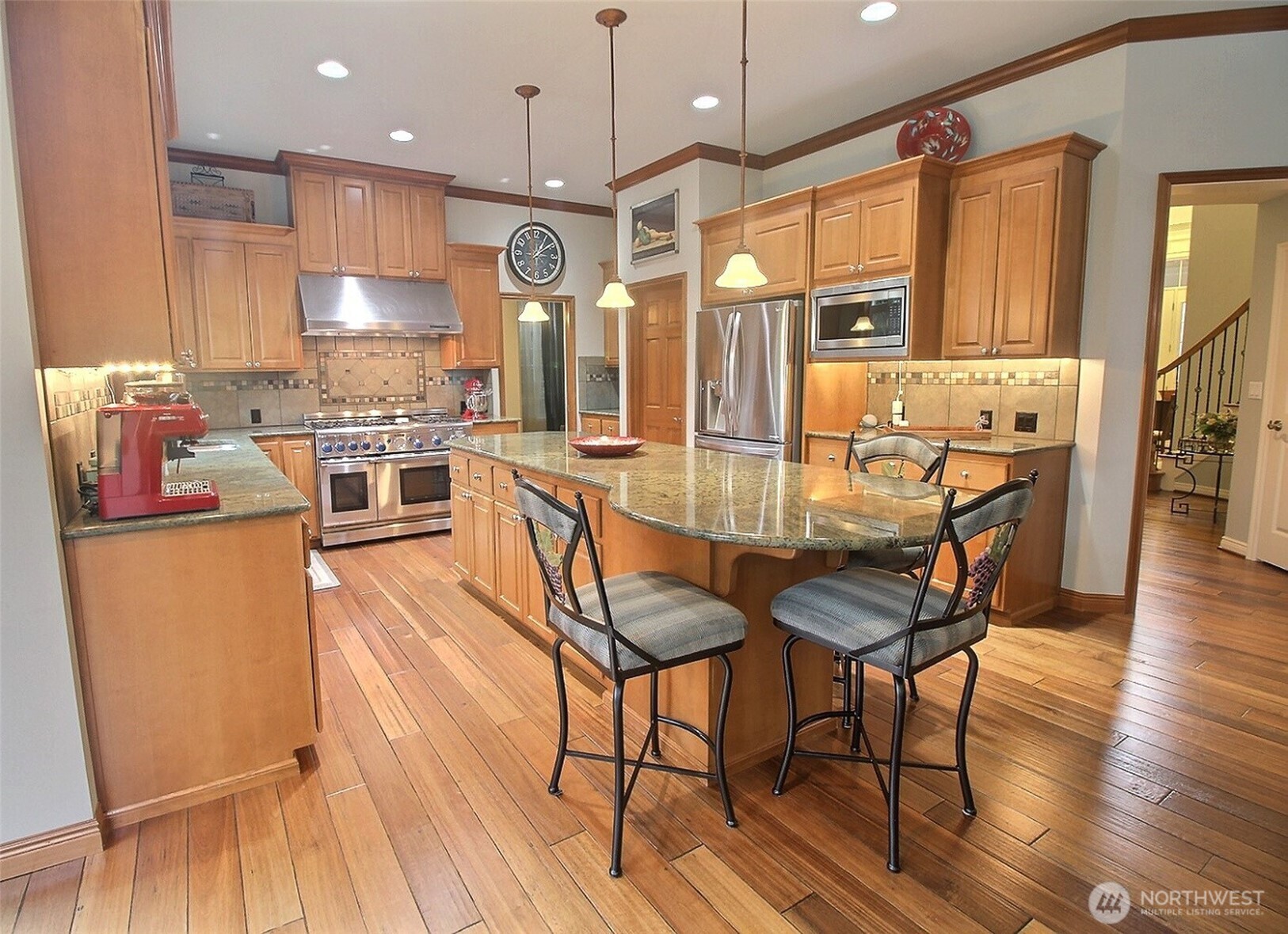 The 46" Thermador Pro 6-Burner Gas, double oven, griddle, and the beautiful backsplash.