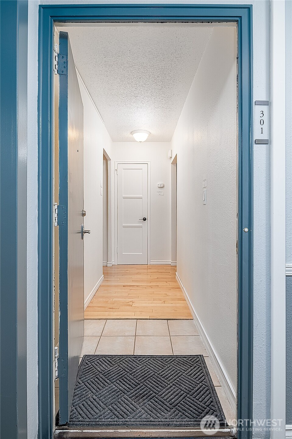 Welcome Home! Nice entry with tile floors and room for a bench, shoe organizer or a stylish coat rack...