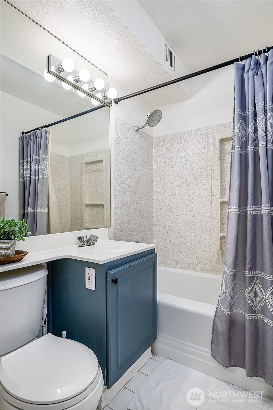 Bathroom with resurfaced shower feels bright and fresh