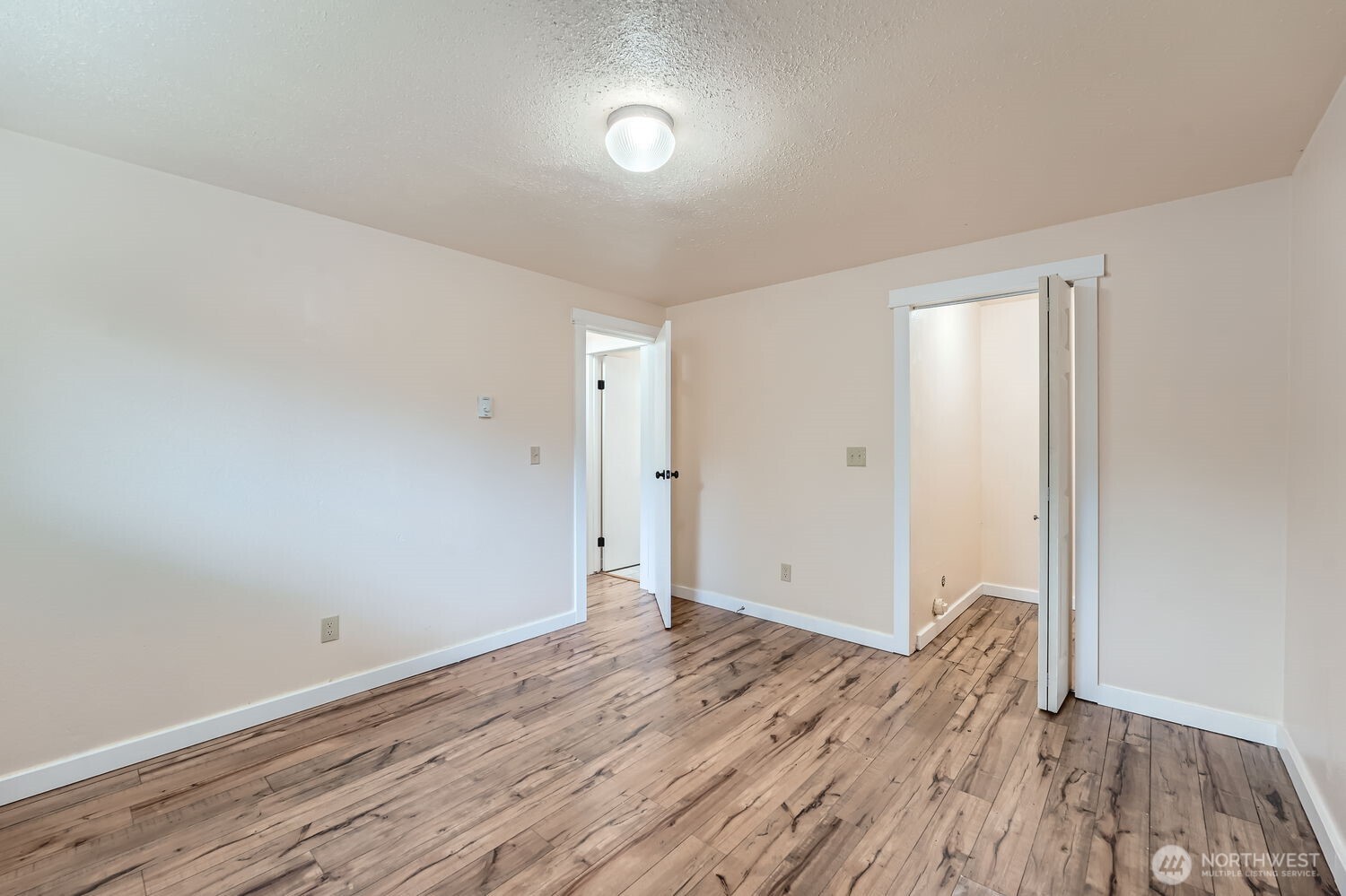 Primary Bedroom with walk-in closet.