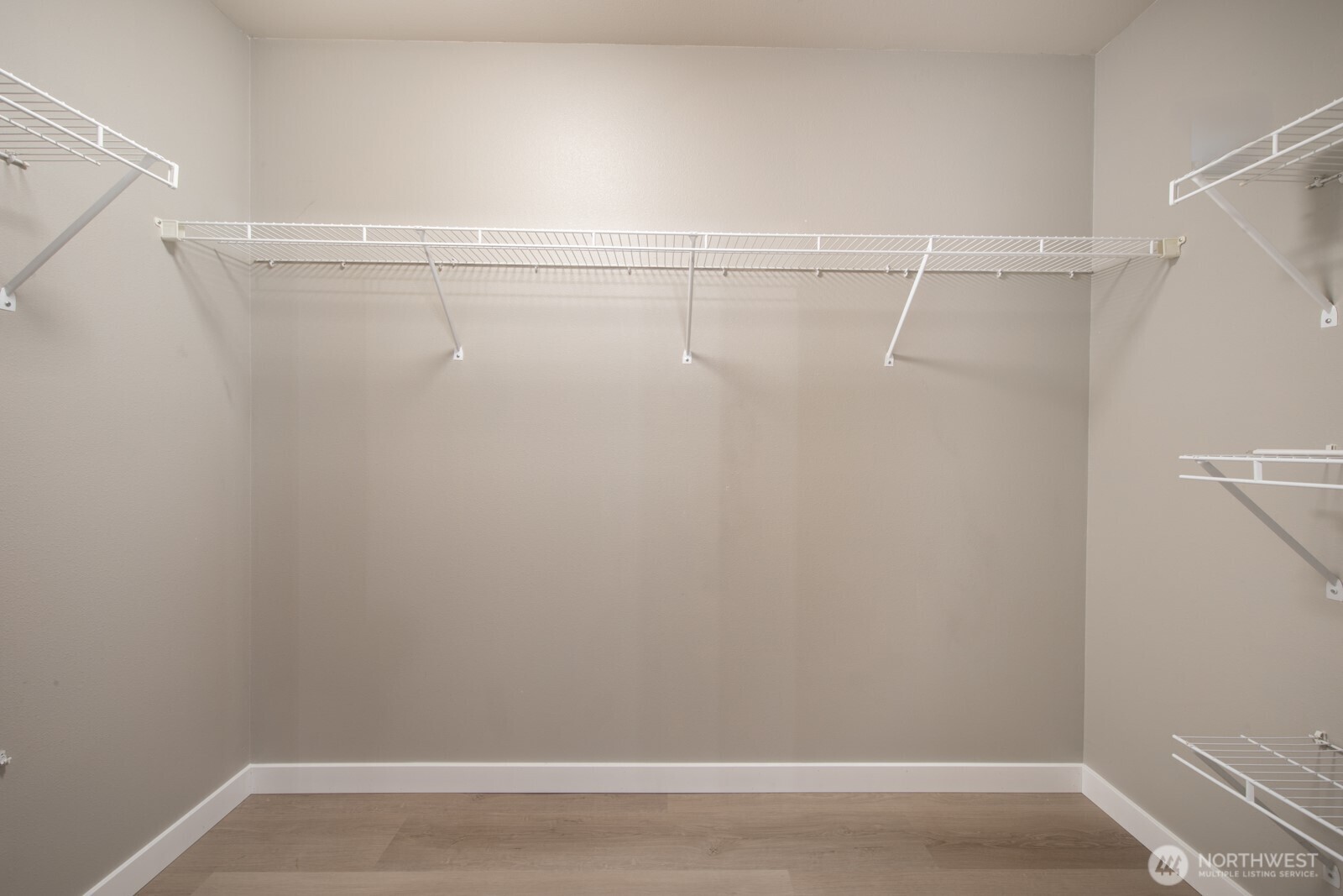 Oversized primary bedroom walk in closet