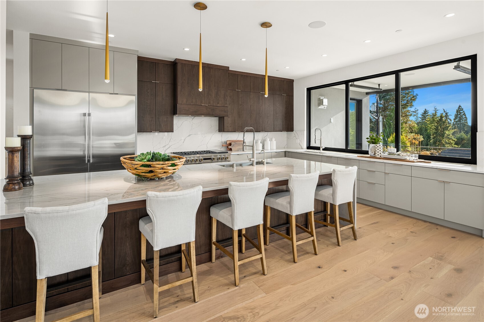 Dramatic kitchen island with lots of seating