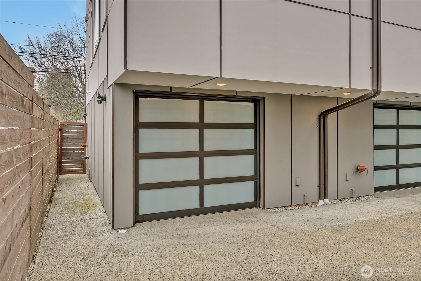 Modern and secure garage plus side gate.