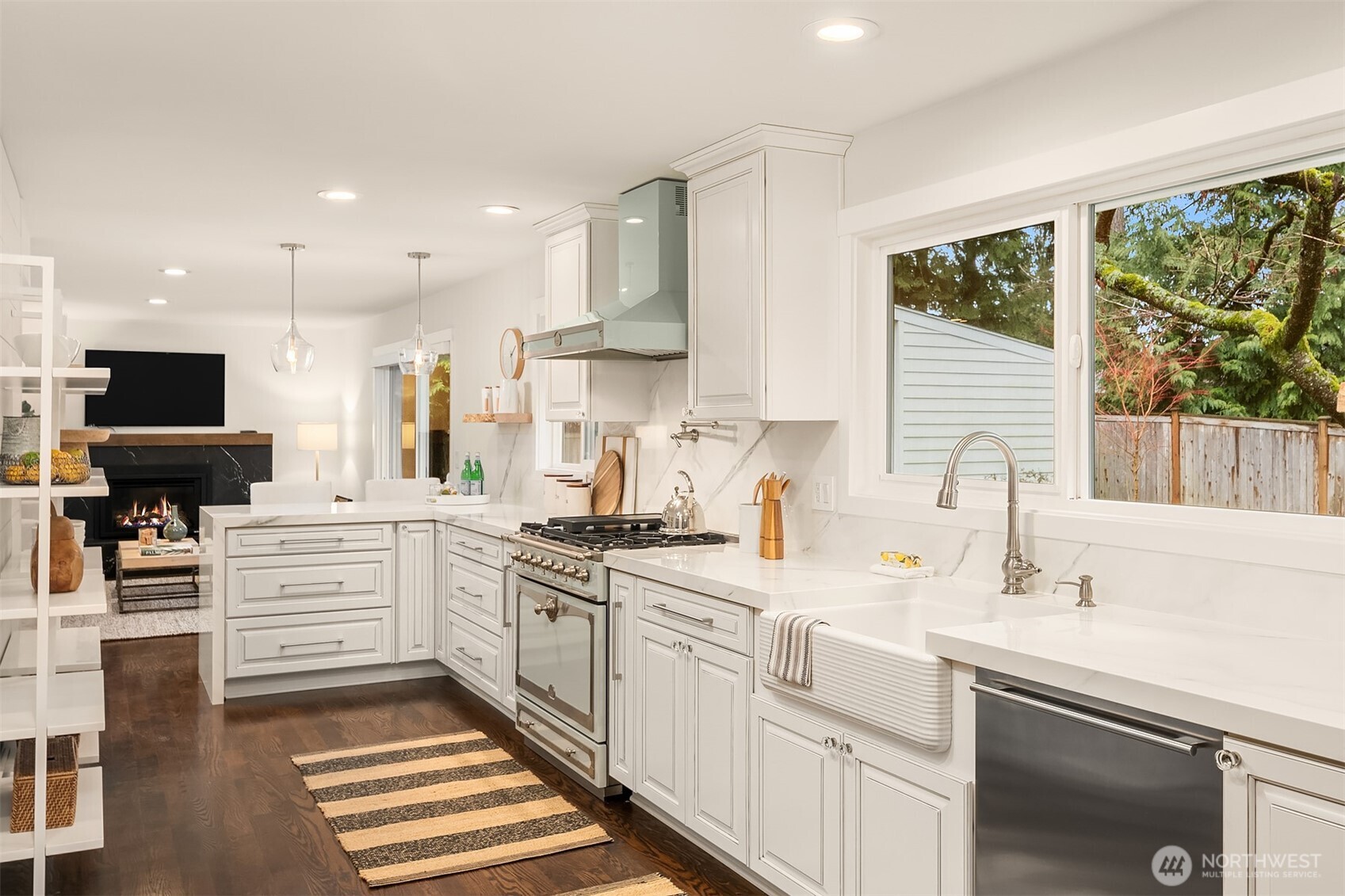 Plentiful storage and counter space adorn this pristine cooking sanctuary.