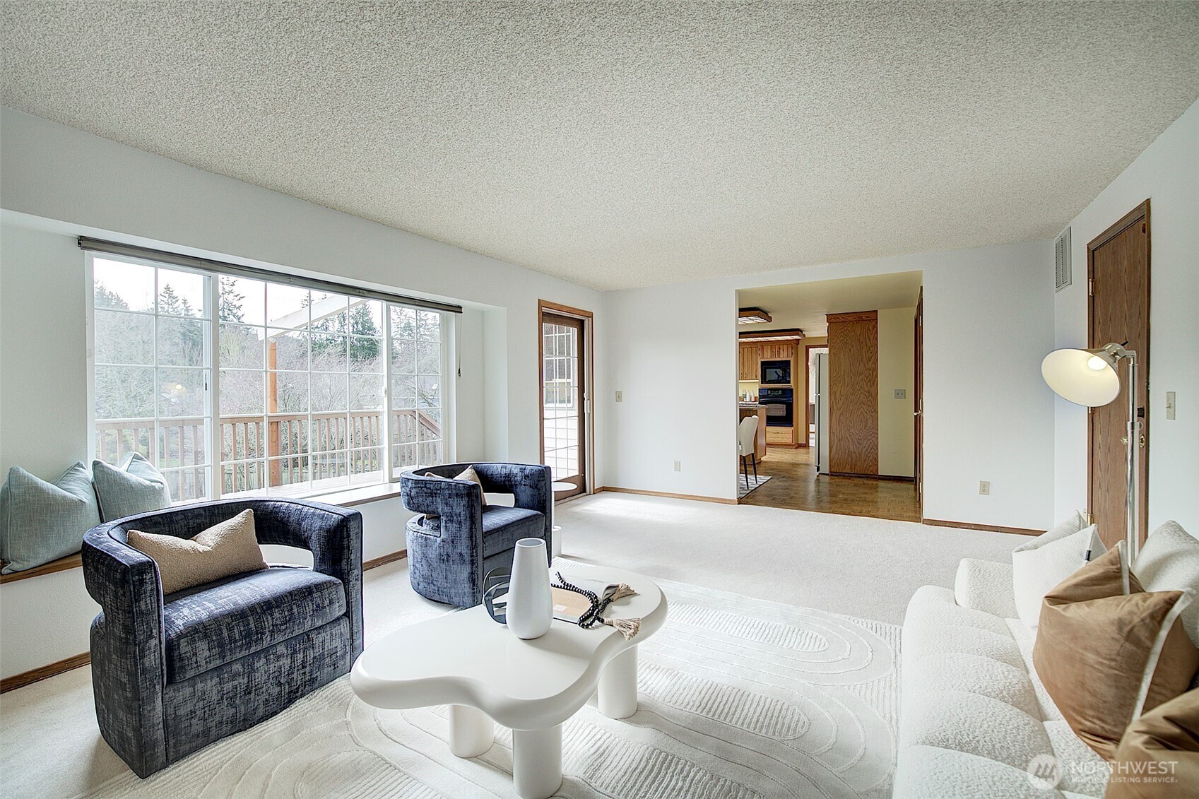 Family room with large windows to the deck