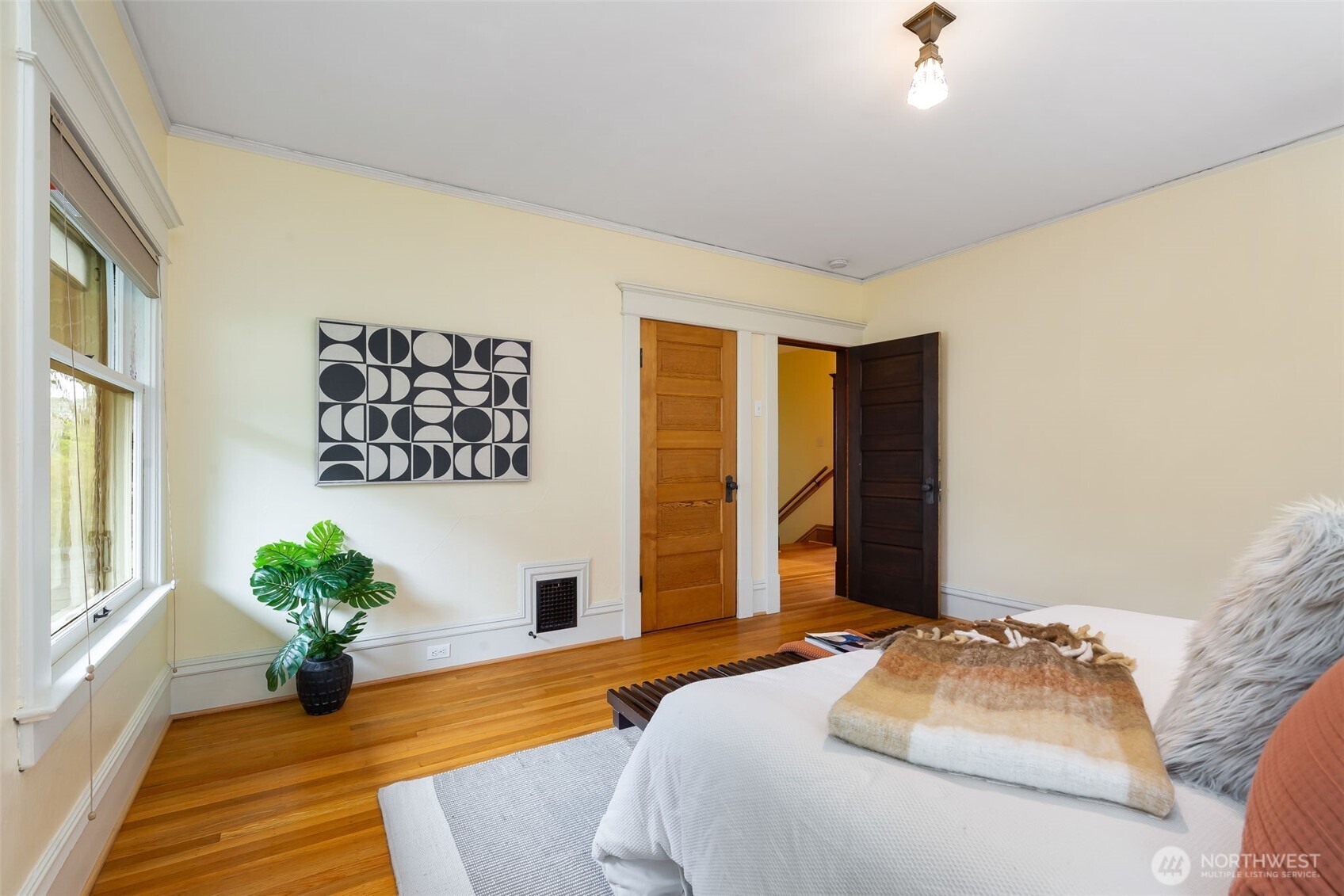 One of three bedrooms (plus a bonus room) upstairs