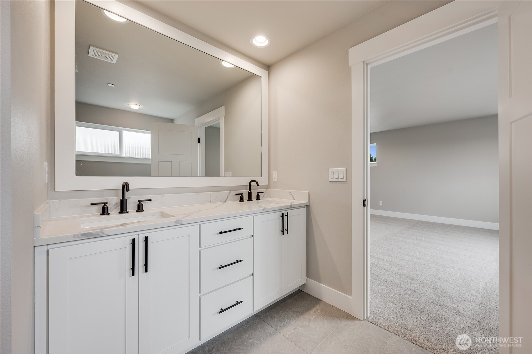 Primary Bath Vanity - Photos of another 2415 plan at Skyline. Color selections will vary.