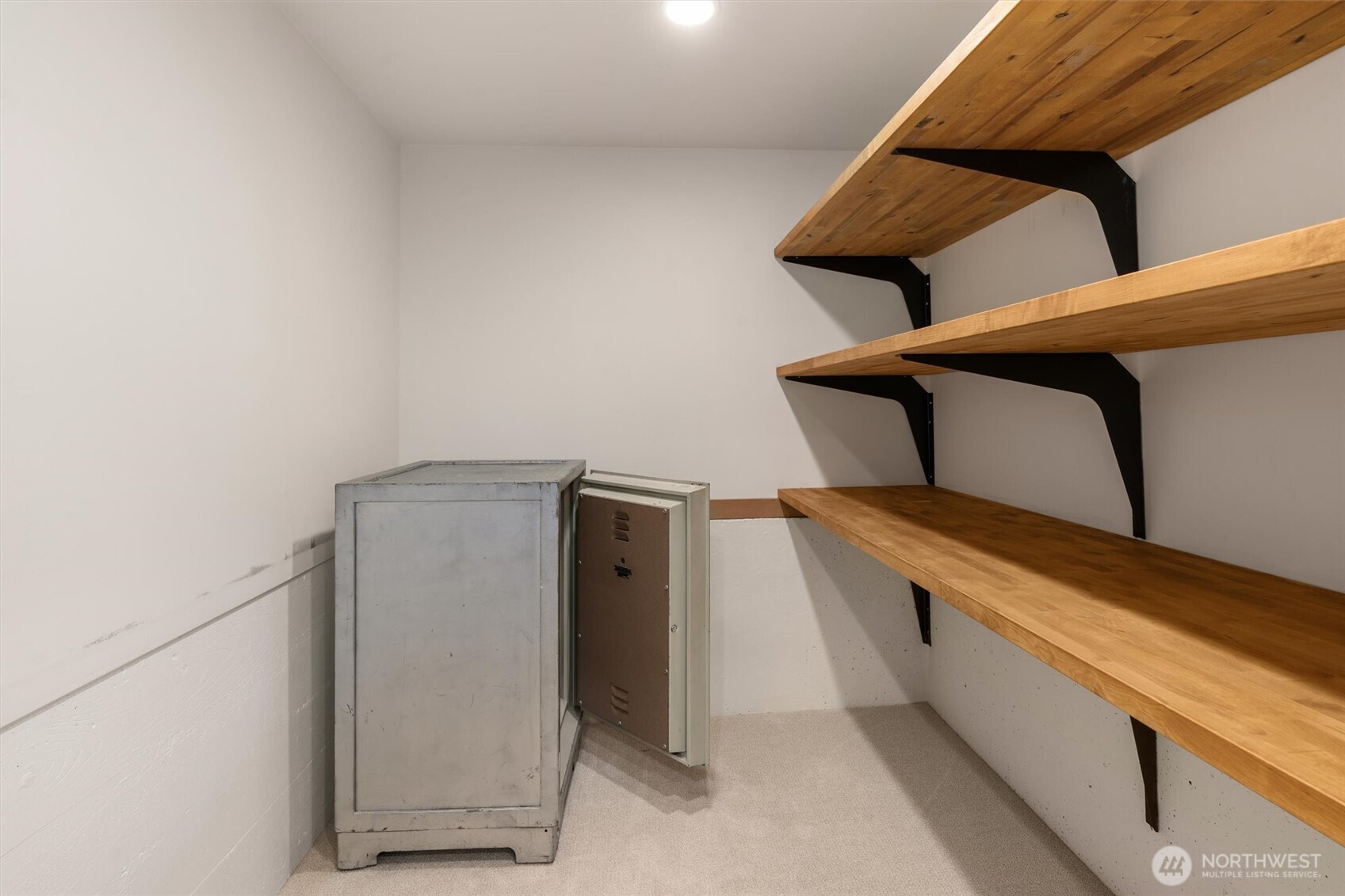 Storage closet with safe (conveys)