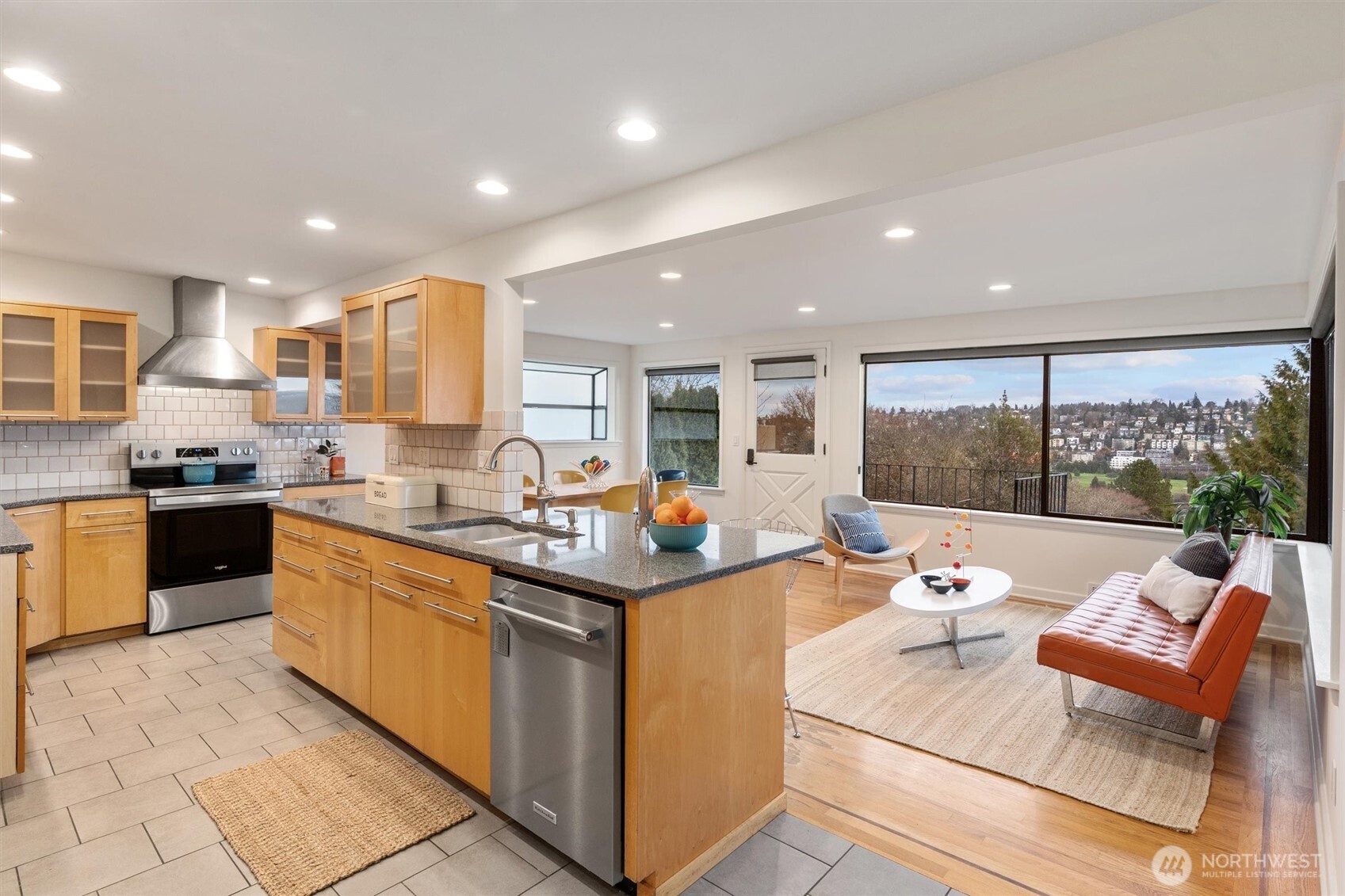 Large, modern kitchen with a rare family room attached.