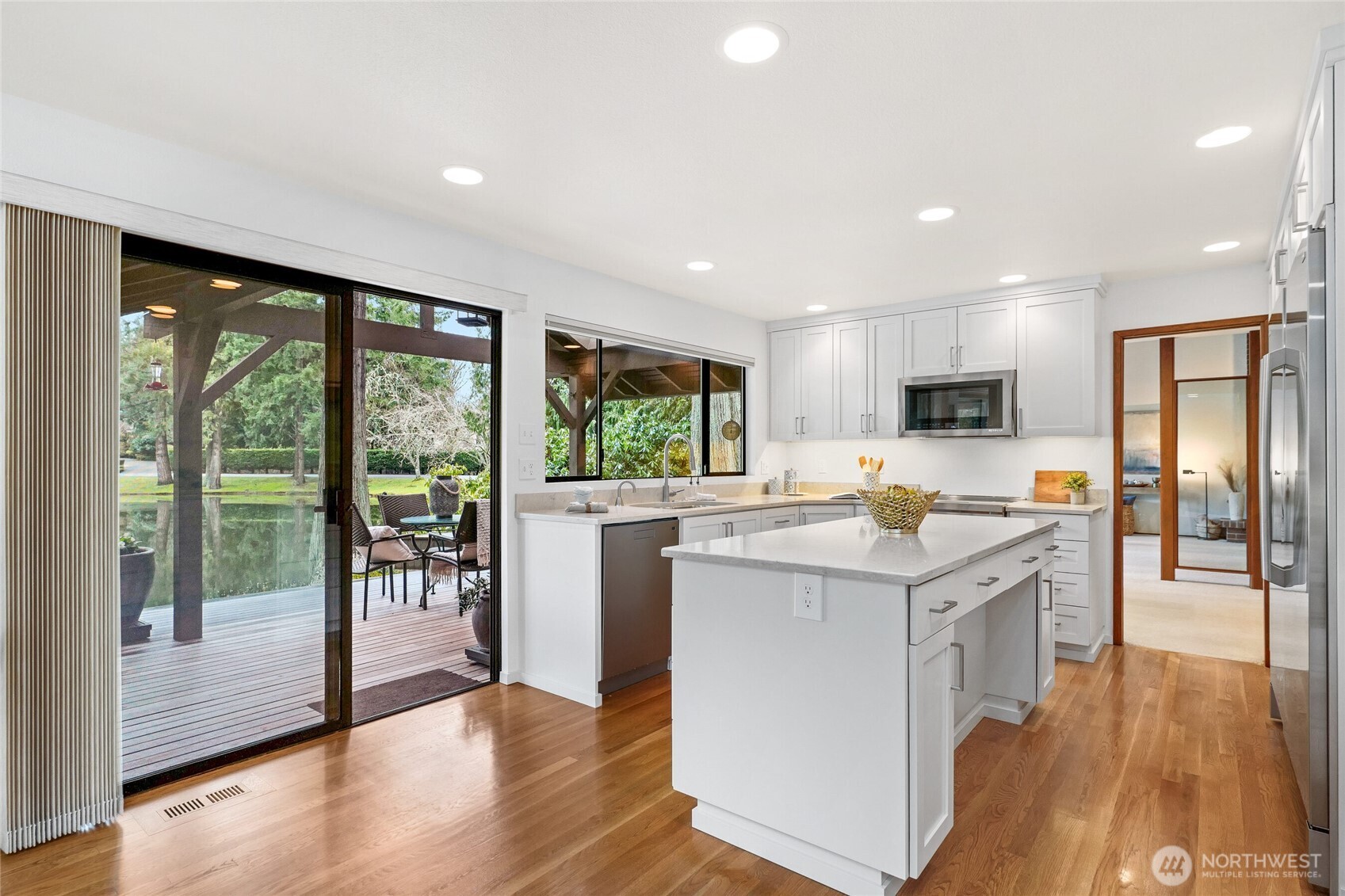 Hardwood floors through out open plan kitchen and family room.