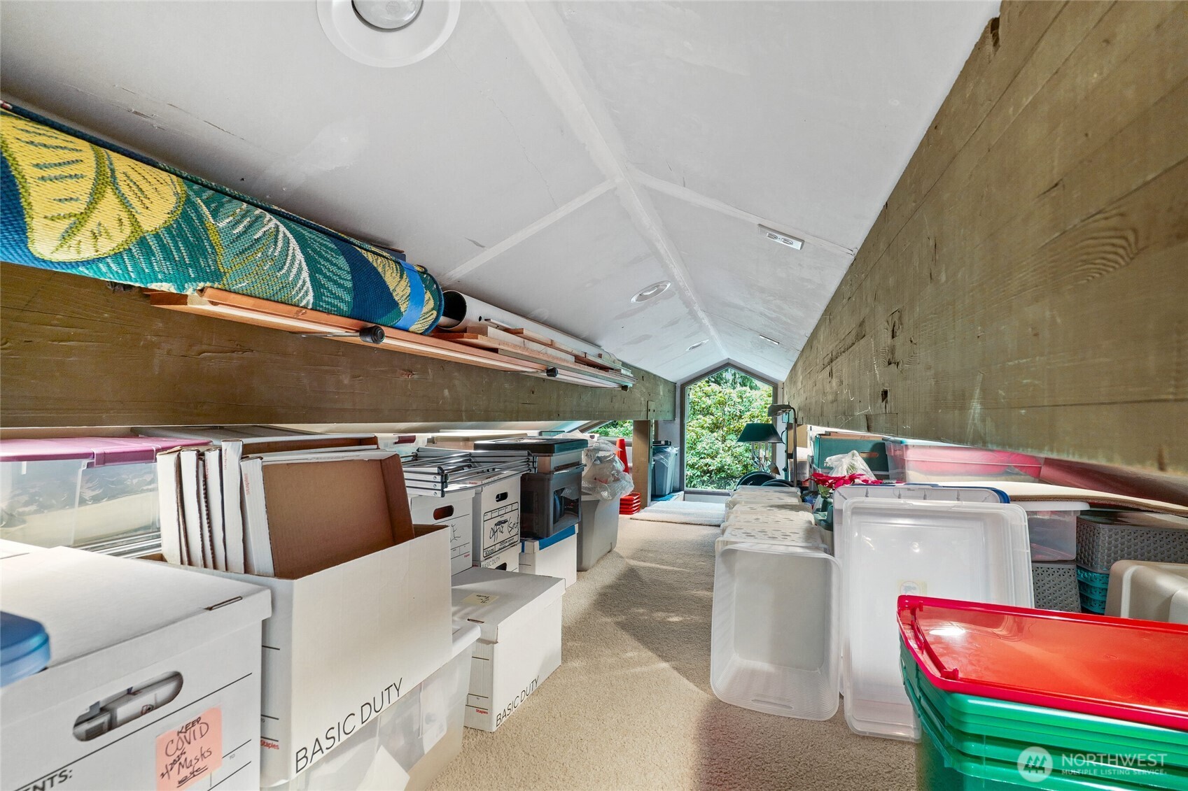 Huge Attic accessed via stairs in garage