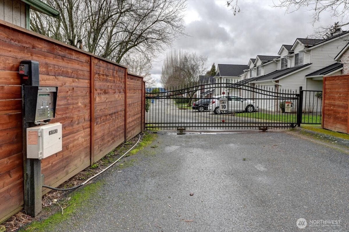 Entry gate and control. Homeowners have remote openers.