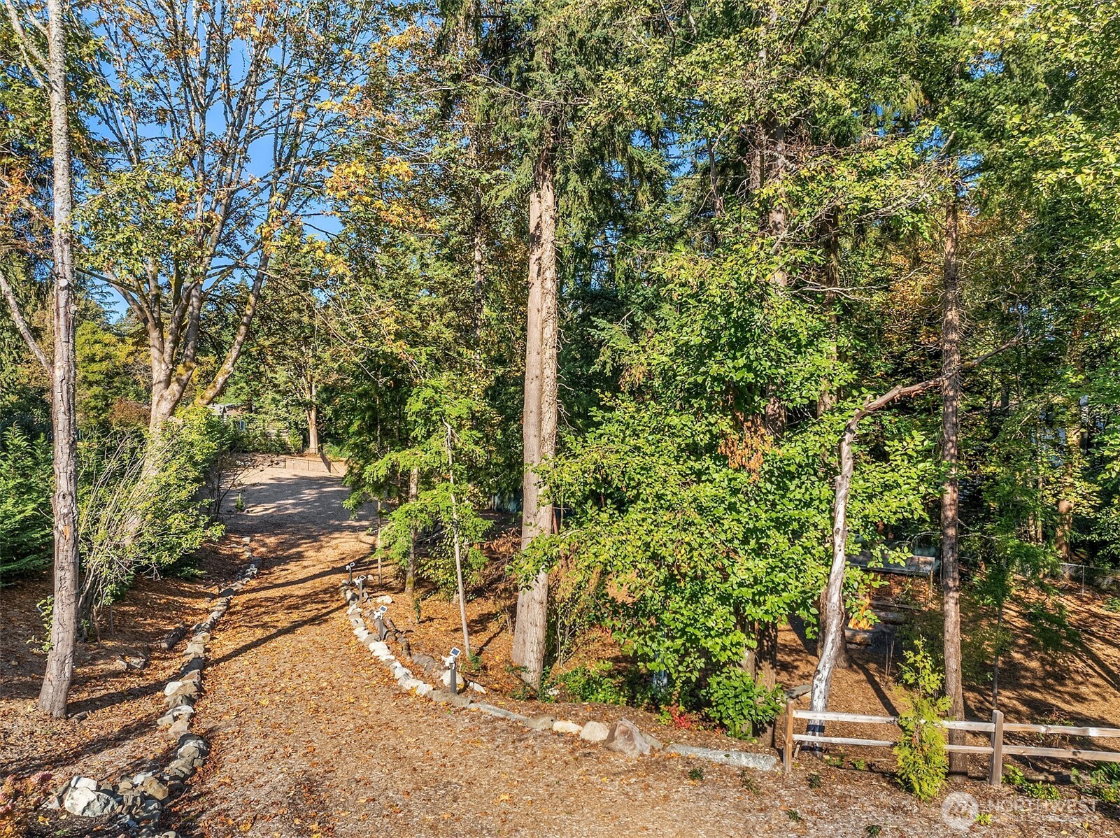 The 2.5 acre Thornton Creek Commons property includes a 1.5 acre arboretum-like permanently preserved open space in the private ownership of the nine Thornton Creek Commons home owners.  Professional landscape maintenance included in monthly Owners Association fees.