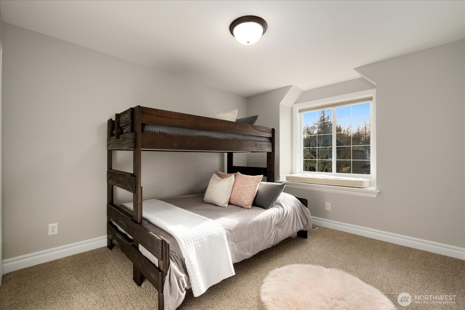 Second floor bedroom #4 with window seat and blackout blinds