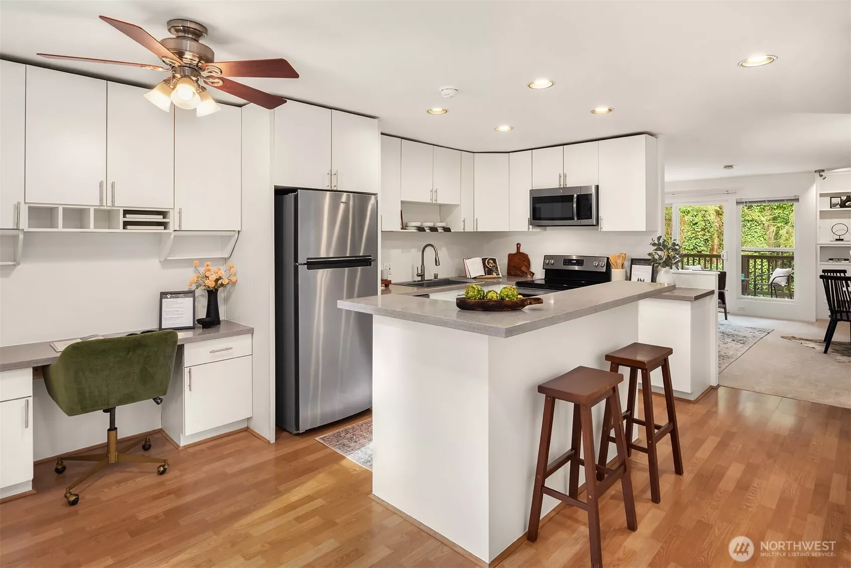 Entrance opens to spacious kitchen with ample storage