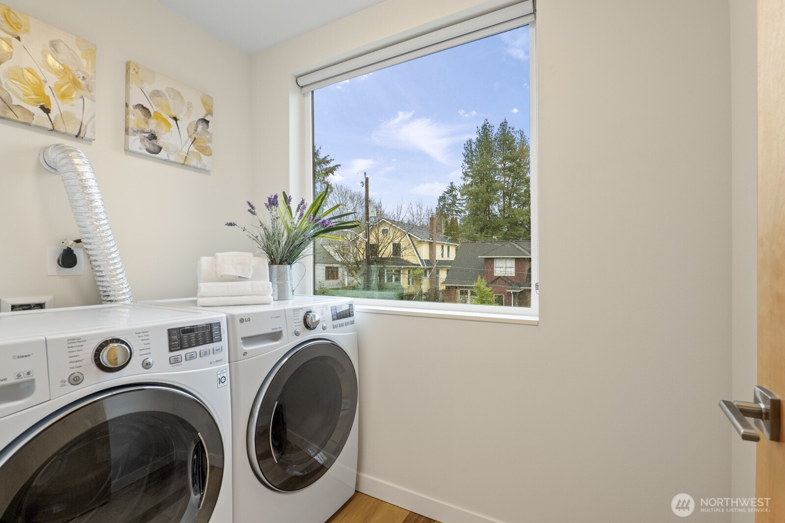 Laundry room just down the hall from the upper floor bedrooms.