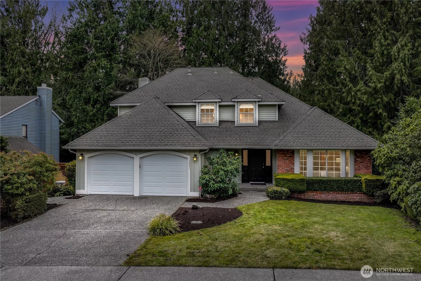 Nestled in the desirable English Hill neighborhood, this beautifully maintained home showcases classic architectural design, a welcoming front entry, and a two-car garage. Mature landscaping enhances the curb appeal, providing a warm and inviting first impression.