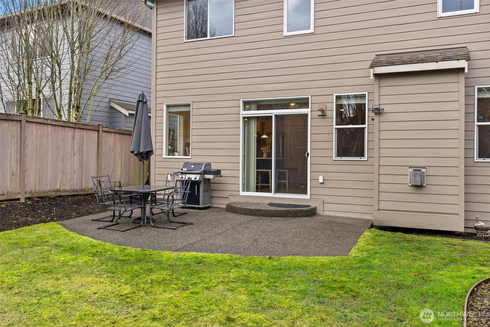 Patio + Fully-fenced backyard