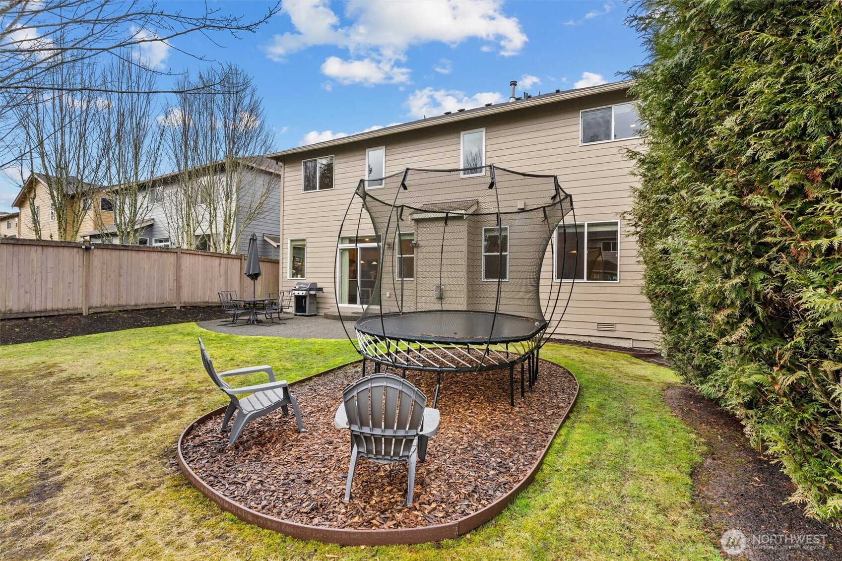 Patio + Fully-fenced backyard