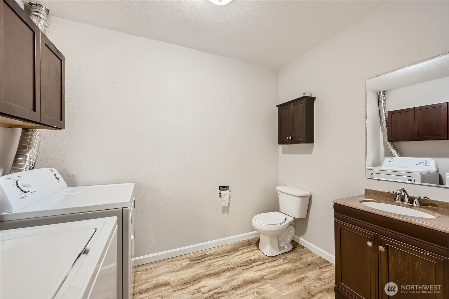 Lower level utility room is also a bathroom, so convenient for the downstairs