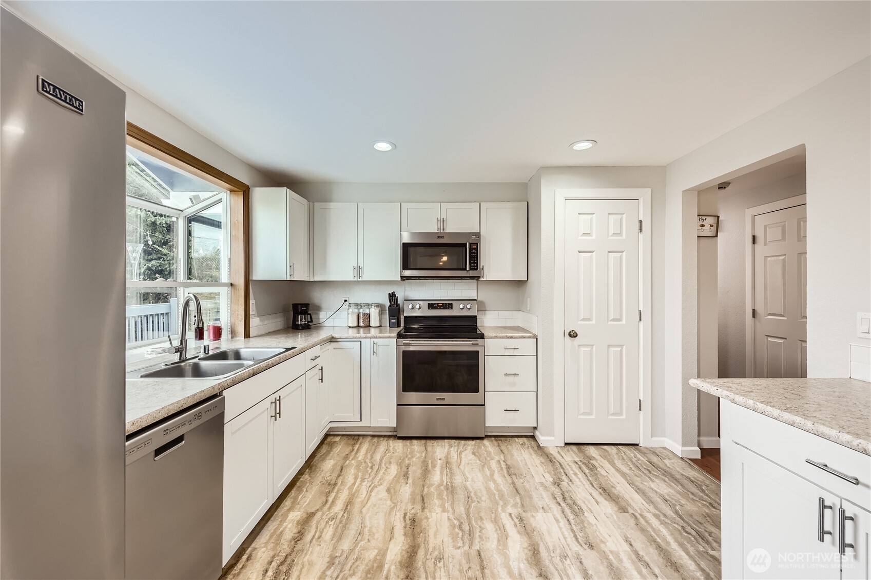 Open kitchen overlooking the back yard