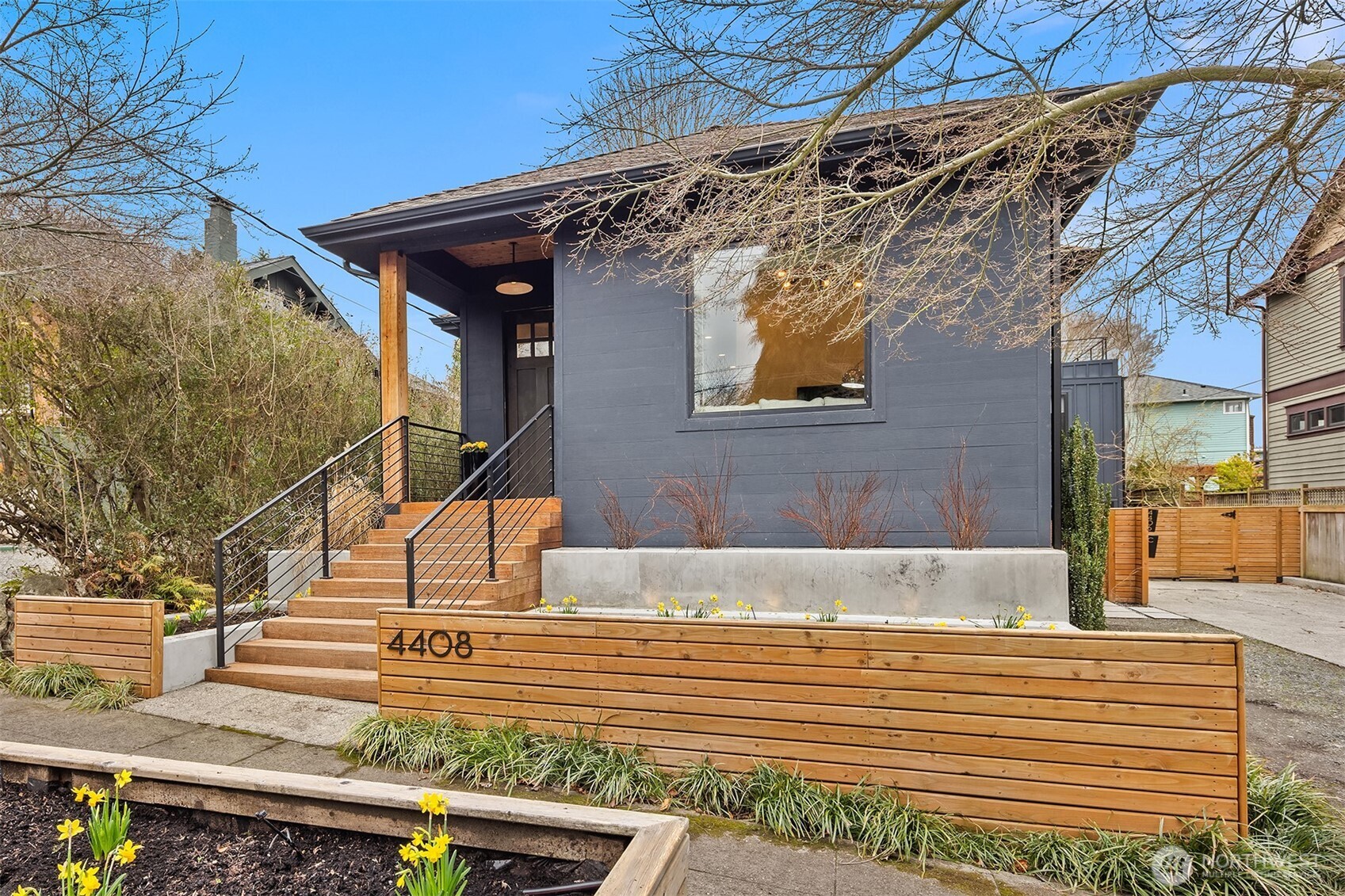 Professionally landscaped grounds with exquisite plantings, imaginative hardscapes and drip irrigated systems throughout. Three large planters at the entry can be planted year-round with gardens of your choice. Imbedded uplighting in the concrete planter wall creates an element of sophistication and drama.